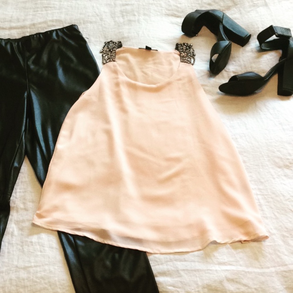 Flowy pale-pink sleeveless blouse